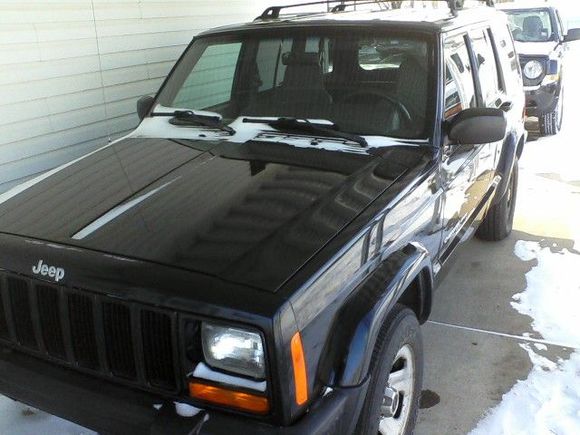 I bought this '99 cherokee just over a year ago at an auction for 3 g's. It was definitely owned by a large person 'cause the drivers seat was busted right down. The right front bolt holding the seat to the slider was broke so if I leaned back I was headed for the back seat.
