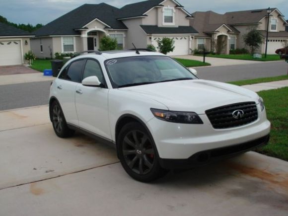 My other ride 2003 Infiniti FX35    SOLD
-Graphite Colored stock 20" wheels 
-Blacked out grill and taillights
-Home done black housing headlights