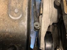 I used my Craftsman 3/8” breaker bar to relieve tension on the serpentine belt , it fits from below 