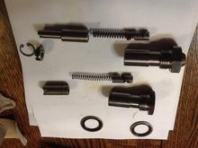 These tensioners have release mechanisms to apply spring tension after you tap the chain shoe to release the spring pressure. 