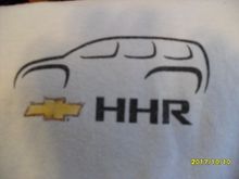 Back of shirt near collar, not very big.