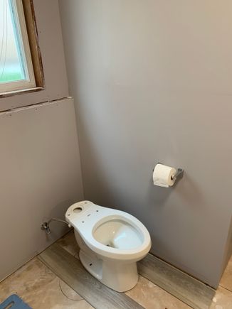 T/P holder, testing the toilet, at this point I still need to remove some cement to get the flange installed 