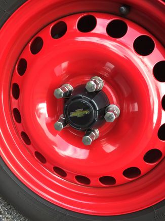 These are OEM 16 inch LS wheels, powdercoated Bull Red, tge caps are from a Toyota pickup truck the lug nuts and stainless caps are from a 1989 Pontiac Firebird GTA