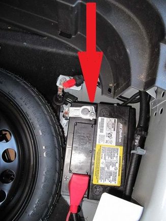 The 10 mm nut is simply loosened then you wiggle the battery cable off the post, you do not remove the bolt 