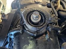 #3. Lower timing belt cover shredded around the Crank area, and harmonic balancer off.