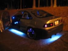 my car...well 1 picture with some lights on n yes i have multi color lights in wheel 2 what?!?!?! lol