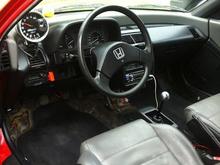 Interior when I bought it.
It now has new carpet and OEM shift boot.