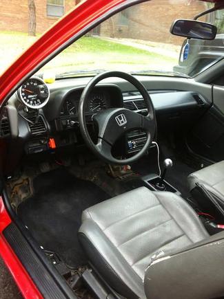 Interior when I bought it.
It now has new carpet and OEM shift boot.