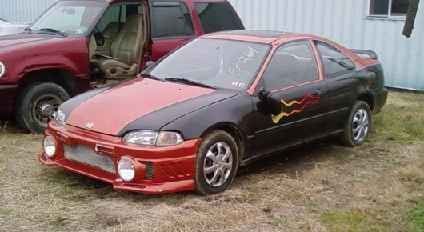 The Civic when i first bought it... paid a whole Grand for it lol