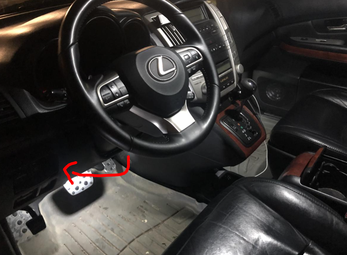 How to disable side mirror tilting down when the 2007 RX350 is put in