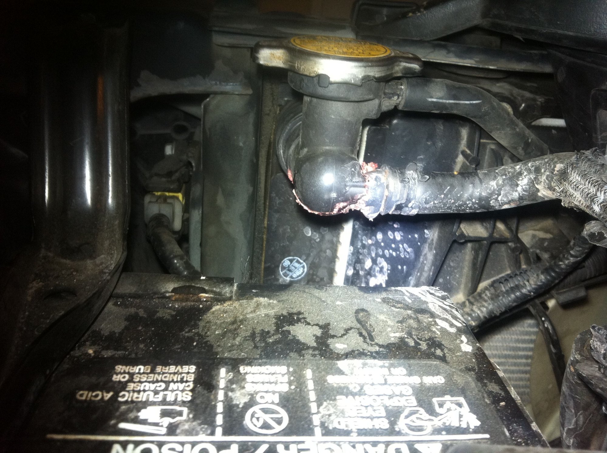 Radiator coolant filler neck leak is this coupling a factory part