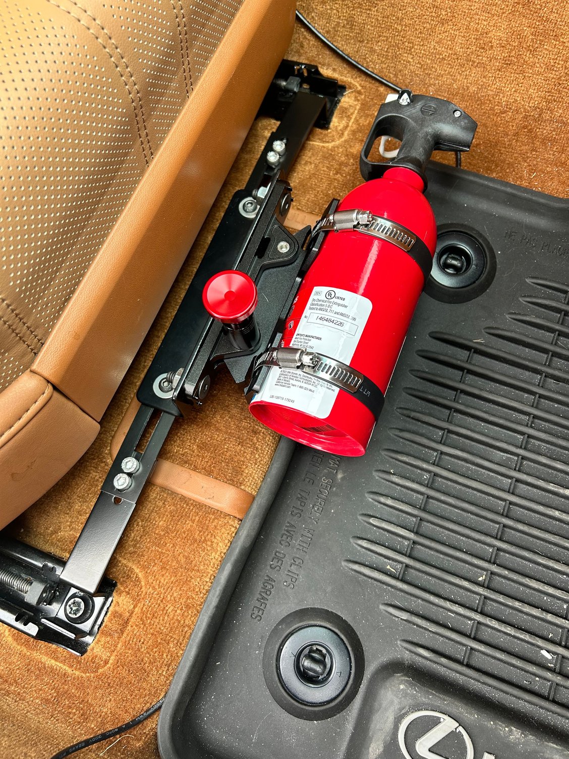 One of the rules calls for a cabin-mounted fire extinguisher. Here�s mine.