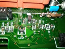 Here you can clearly see an up close pic of the R2 Resistor the had been jumper wired and soldered to make the TAC work