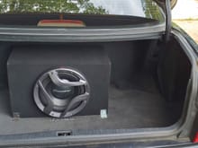 Single 12-in Pioneer carbon fiber impp in an Alpine ported box with a Menace Audio 2 channel 800 watt amp for the sub