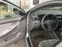 The interior exists, switch gear is "eh" feeling and totally surpassed by anything newer in this class. AC is very very good though, ergos are bad and there isn't even an armrest. Headlights suck 