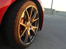 close up of front passenger rim and tire