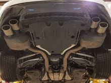 OEM exhaust system before Borla exhaust system.
Note the bends and restricted exhaust outflows of the OEM exhaust system.