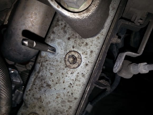 To maximizeimprove ng, ran a tap through the body ground bolt hole  to remove paint and any corrosion. The engine side bolt hole looked fine.
 Use anti-seize compound on threads when reassembling