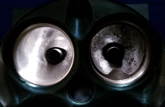 Good comparrison pic of the intake ports.  Mild porting on left and untouched factory port on right. 