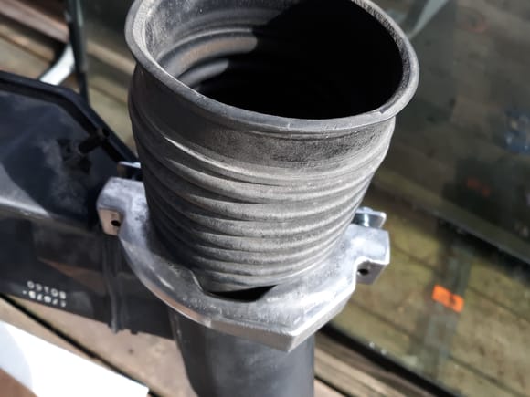 Yard pull air intake silencer depicted with mass damper configured to tube profile. Several compound curved. 