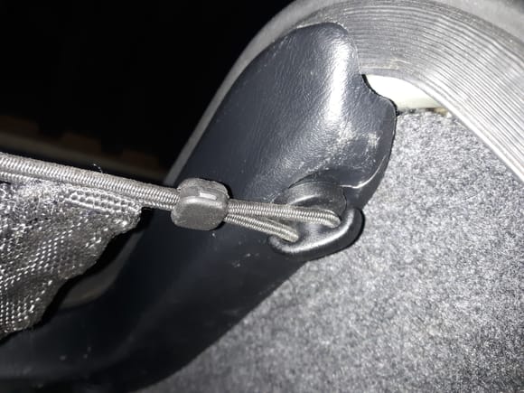 Trunk net fasteners s-c-r-e-w in vs. push in plastic clips.