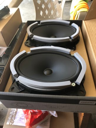 (Front doors) 
Audiofrog gs690 6x9 speakers,
 100 watts RMS @4ohms

 came with mounts from crutchfield, but I had to drill one hole on each because only 3 screws lined up to connect speaker to mount. 
$330 crutchfield- came with wiring harness and mounts for free. Free shipping