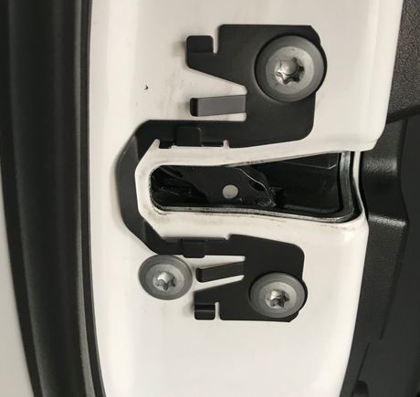 TRD door latches which fills gap between car door & body to make a more solid connection, reducing chassis flex. 
