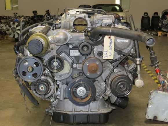 Image showing 1UZFE engine with stock alternator installed.