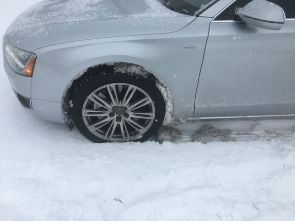 The main issue I had was snow buildup in the front arches, I knocked it off before I parked. I drove the whole way in high mode to give the wheels more space.