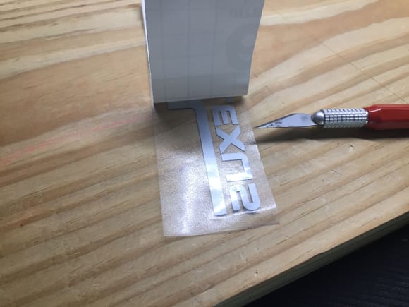 The video I watched for this problem showed peeling the paper back at an aggressive angle instead of using the vinyl.  Didn't work for me. How to use a X-Acto knife to transfer the decal.