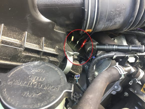 Routed the wire in the front of the engine. I took every shortcut that was possible with the large connector and only made it to here. When I permanently install it I will try going over the engine but looking at it I don't know that it would help much if at all.