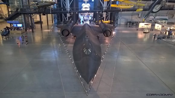 The infamous blackbird stealth bomber looks even more ominous in person. Note shuttle in background perfectly aligned.