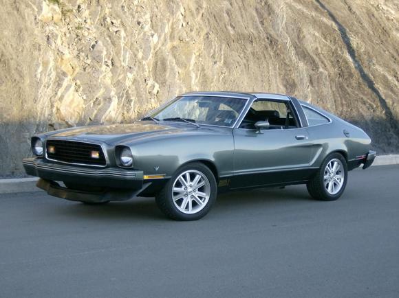 I restored the car with a friend in his garage.  It was painted in pieces with the thoughts of painting it again when I reassembled, but it all matched.  It is 1 of 494 T-top model Mach 1s in 77.  There were only approx 6900 Mach 1s built that year.