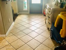 I love and hate the tile. I love how they laid it, but not the color. I think that is what we are going to tackle next. 