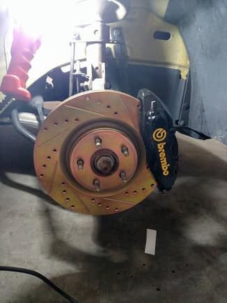 yellow brembo decals from SignSomething, a vendor on here.  Sells them for $4.99 I think per pair.  good deal.  also final look before wheels go on.