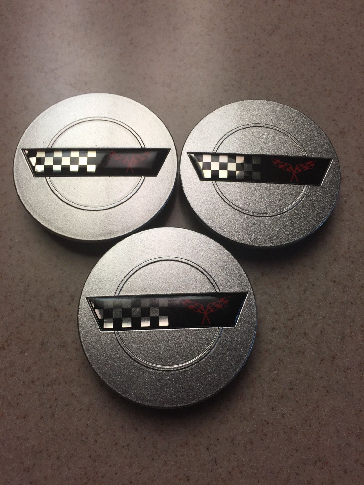C4 center caps with Crossed flags logo CorvetteForum Chevrolet