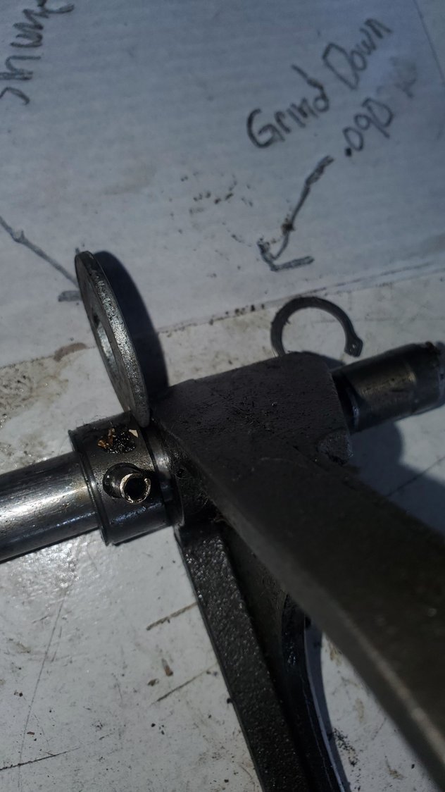  This is where you add shim to move fork closer to gear. Your shifting the fork closer so travel is shorter and can make more force to completly engage syncor so it doesnt pop out