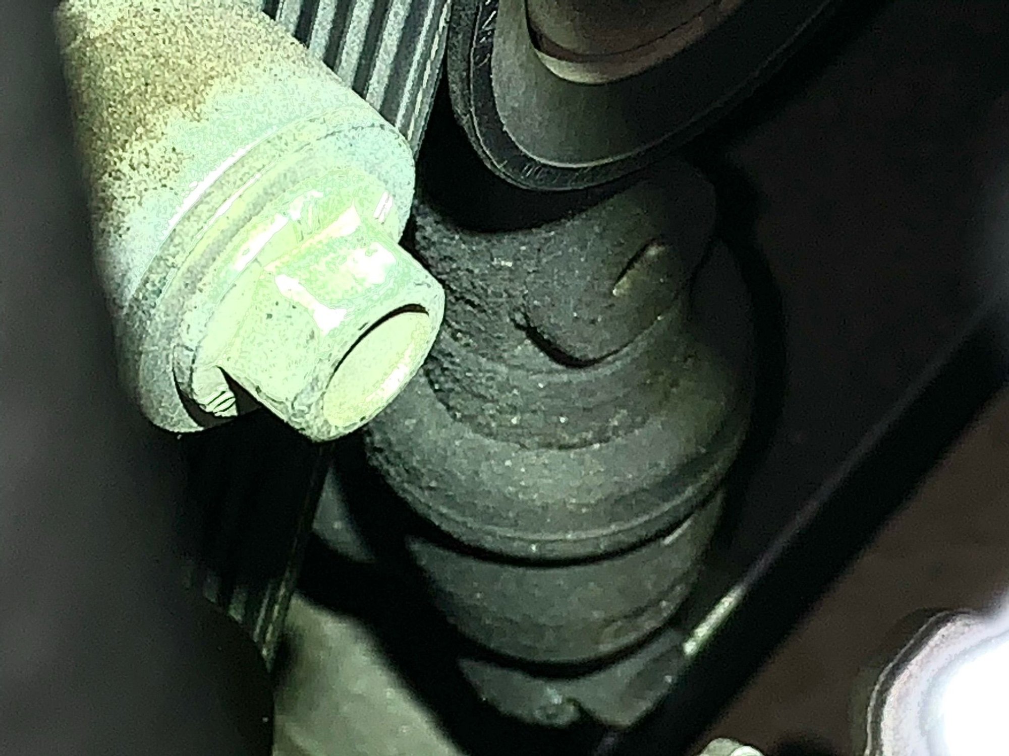 Is a leaking Drive Belt Tensioner Assembly Covered under GM Extended