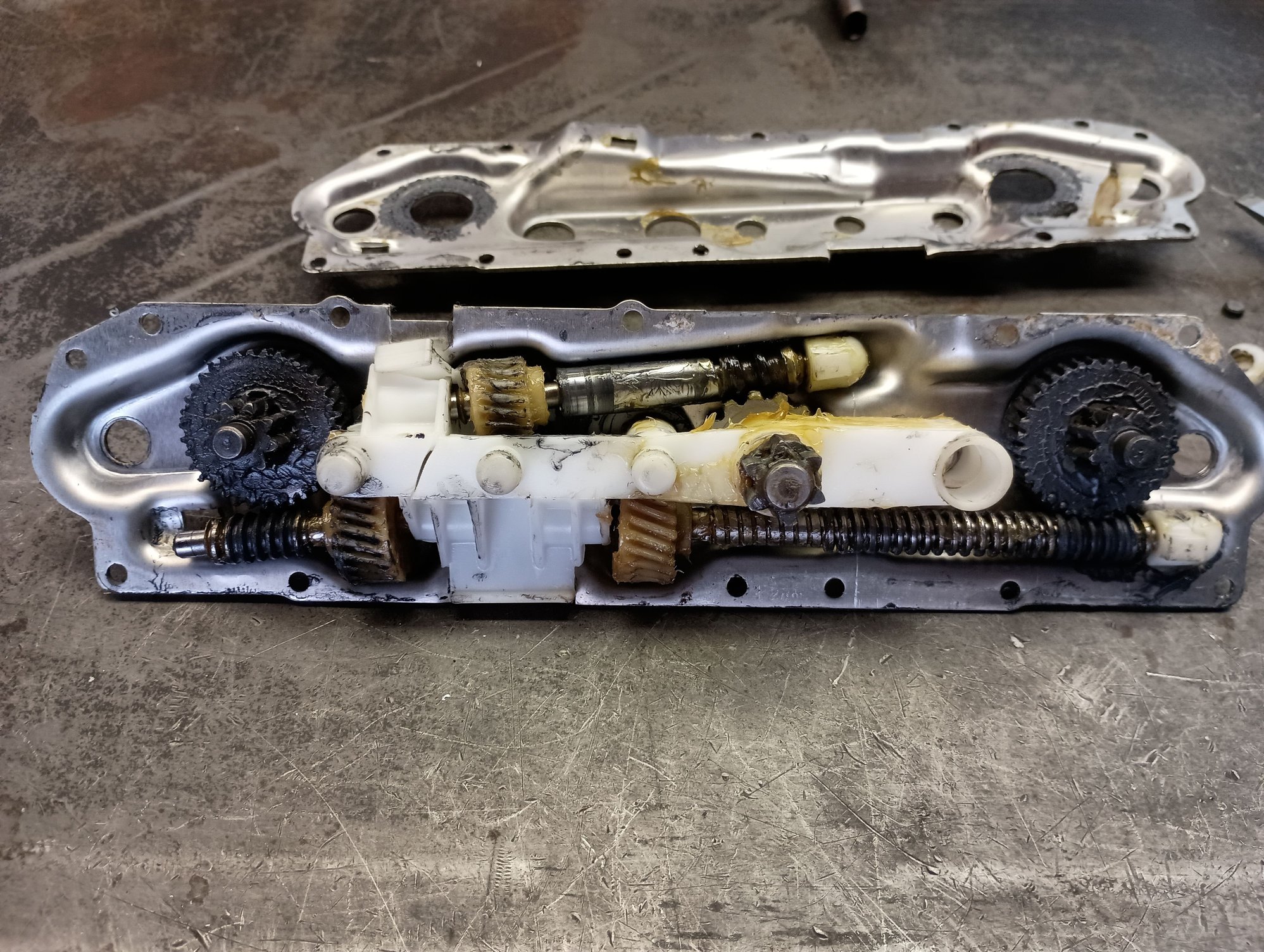 The transmission after drilling the rivets and opening it up.