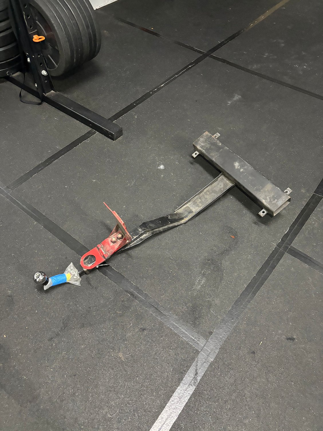 Custom tow hook / cradle / hitch / ball. Bolts directly to former leaf spring location. 