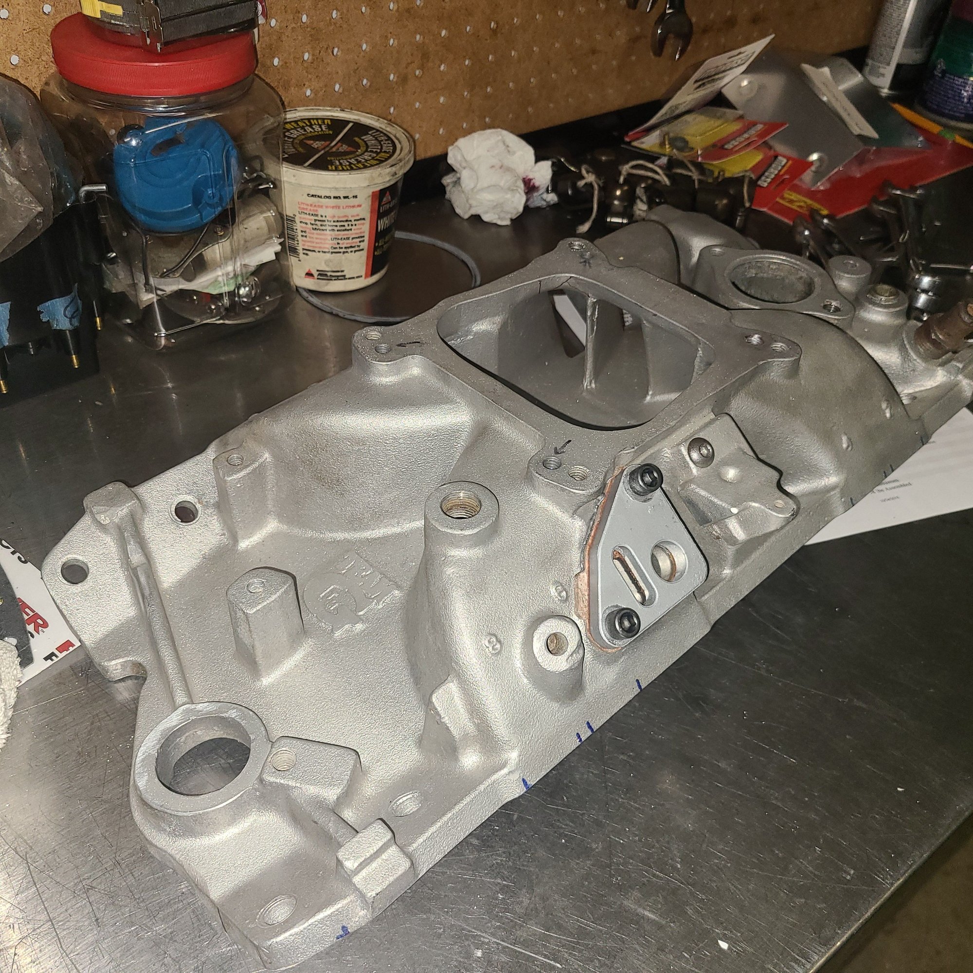 Weiand Team G 7525 EGR style intake.  Long out of production.  2000 - 6000 RPM range. Very low height to fit under the hood of any C3.  If I did not have it, I would just buy the IMCA intake.