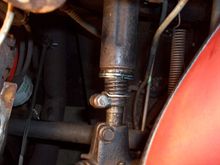 Two large (1-1/4" dia.) washers against the bearing outer race.
