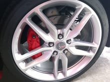 Standard silver wheels with optional red calipers