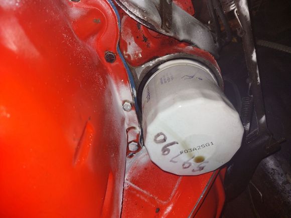 Leak around oil filter adapter.