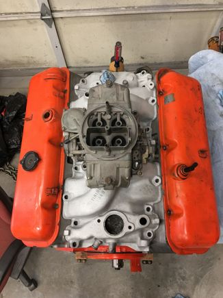 Manifold, carb, and I believe correct 66 valve covers as well.