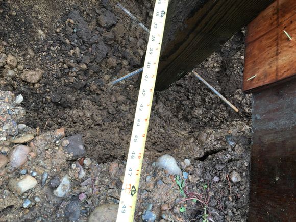 Rebar through the post with a good amount of concrete under it so they won't sink