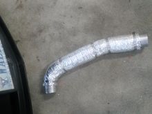 Insulated intake pipe ready for installation.