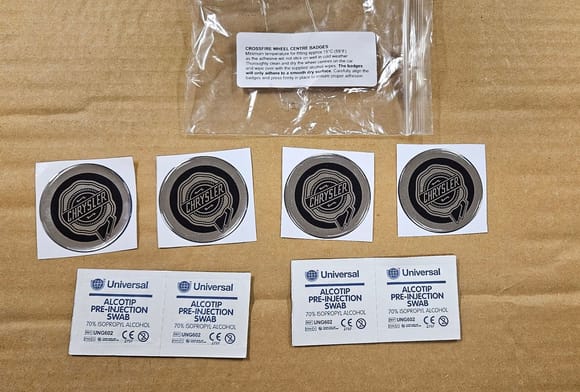 This is the set of new wheel badges with alcohol prep wipes.