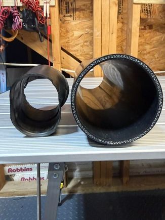 Probably the most dramatic difference is in the final section of the intake hose on either side of the radiator.  The oblong shape restricts the air flow even before it gets to the filters.  The 3" silicone hose has to be squeezed to get it through the opening, but still provides a greater air intake volume and can be extended further to the front of the radiator for cooler air.