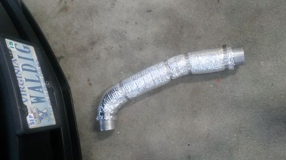 Insulated intake pipe ready for installation.